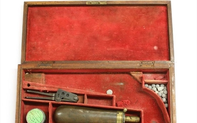 A mahogany revolver case