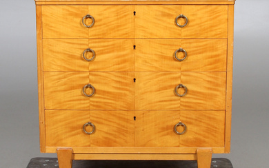 A mid 20th century hardwood chest of drawers.