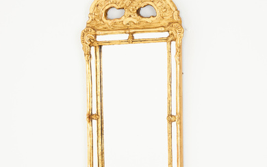A mirror, early 20th century, rococo style, gilt, partly cut decor.