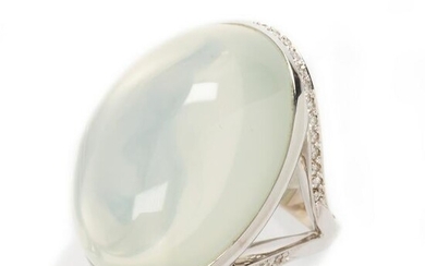 A moonstone, diamond and eighteen karat white gold ring