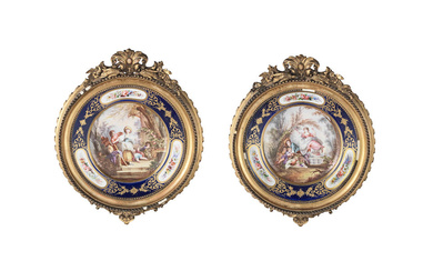 A pair of 19th century French porcelain cabinet plates mounted...