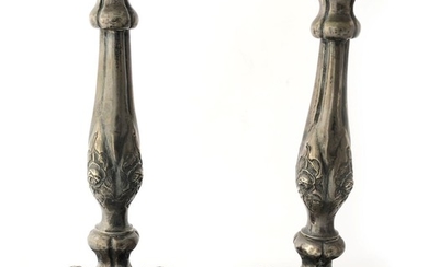 A pair of Altwien candlesticks, The candlesticks have beautiful...