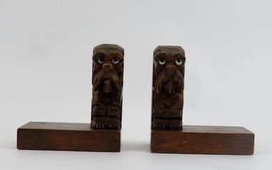 A pair of Black Forest dog bookends, early 20th century. The...