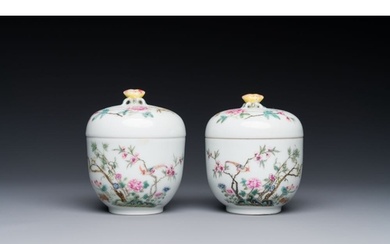 A pair of Chinese famille rose covered jars with birds and f...