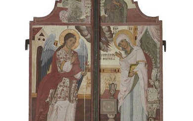 A pair of Greek polychrome decorated doors from an iconostas, early 19 century, the central scene depicting the Annunciation with the Archangel Gabriel and the Mother of God in an architectural setting, the shaped upper sections with Solomon and...