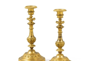 A pair of Louis XVI gilt-bronze candlesticks, probably by the bronzier Pierre-Auguste Forestier, after a design by Jean-Démosthène Dugourc (1749-1825) | Paire de bougeoirs en bronze doré d’époque Louis XVI, probablement par Pierre-Auguste Forestier...