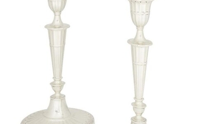 A pair of Victorian silver candlesticks, London,...