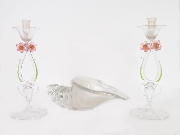 A pair of glass candlestick with applied flowers, leaves and handles and a opalescent glass seashell Murano, 20th century