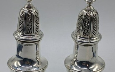 A pair of large 20th century silver sugar sifters