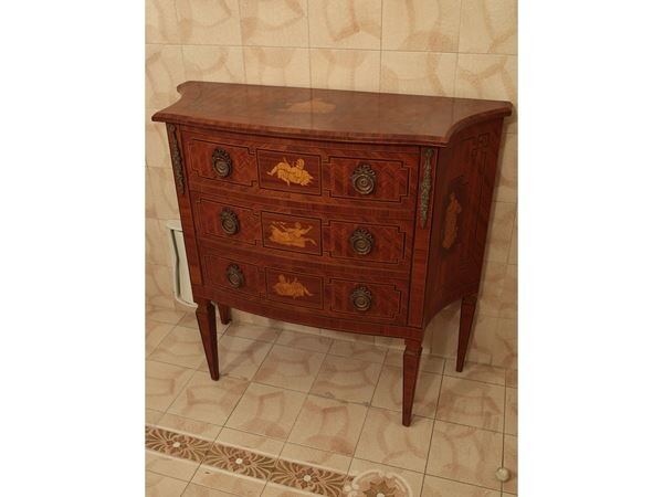 A rose wood and other woods small chest of drawers 20th century