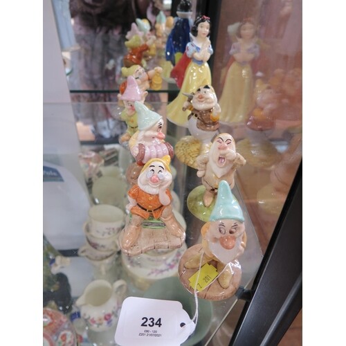 A set of Royal Doulton Snow White and Seven Dwarfs figures S...