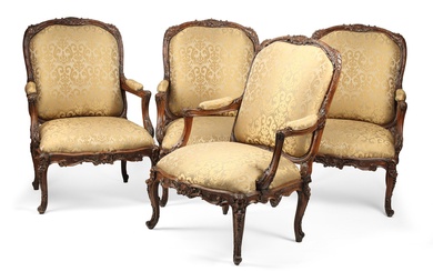 A set of four Louis XV style carved beechwood armchairs, late 19th century