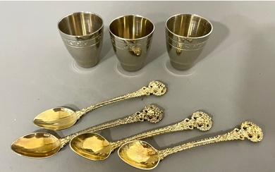 A set of four Russian 916 standard silver gilt ornate coffee...