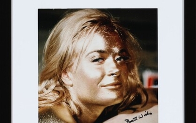 SOLD. A signed colour photograph of the English model and actress Shirley Eaton (b. 1937)...