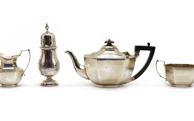 A silver three piece tea service
