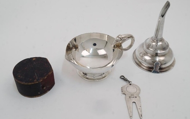 A small group of silver, comprising: a wine funnel, Sheffield, 1995, Hugh Crawshaw, 12.4cm high; a Continental milk jug, stamped 925, with scrolling elephant handle, on stepped circular base, 13.2cm wide; a cased napkin ring, Birmingham, 1893...