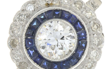 A vari-cut diamond and sapphire double cluster ring.