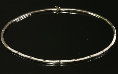 A white gold diamond set collar