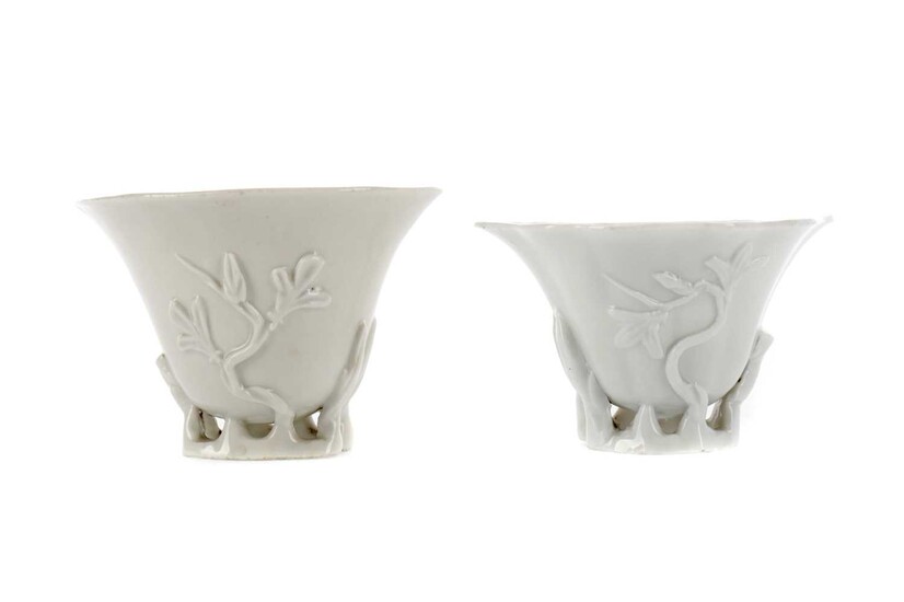 AN EARLY 20TH CENTURY CHINESE BLANC-DE-CHINE LIBATION CUP, ALONG WITH ANOTHER