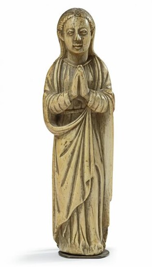 AN INDO-PORTUGUESE CARVED IVORY FIGURE OF THE VIRGIN