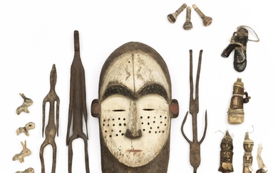 African mask, three iron figures and a selection of bone and ceramic amulets