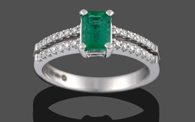 An 18 Carat White Gold Emerald and Diamond Ring, the...
