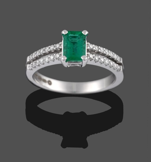 An 18 Carat White Gold Emerald and Diamond Ring, the...