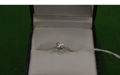 An 18ct white gold and diamond solitaire ring, size J.