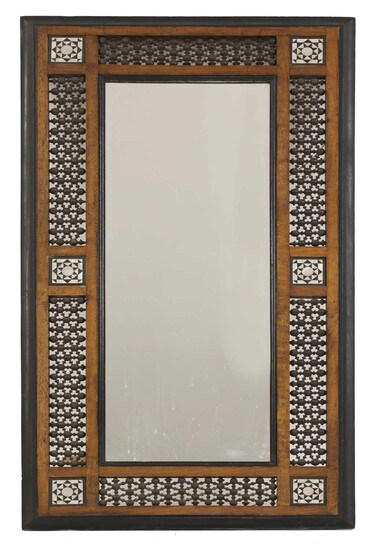 An Aesthetic Movement Moorish mahogany mirror