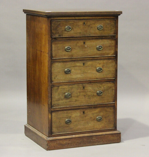 An Edwardian mahogany narrow chest of five graduated drawers, on a plinth base, height 101cm, width