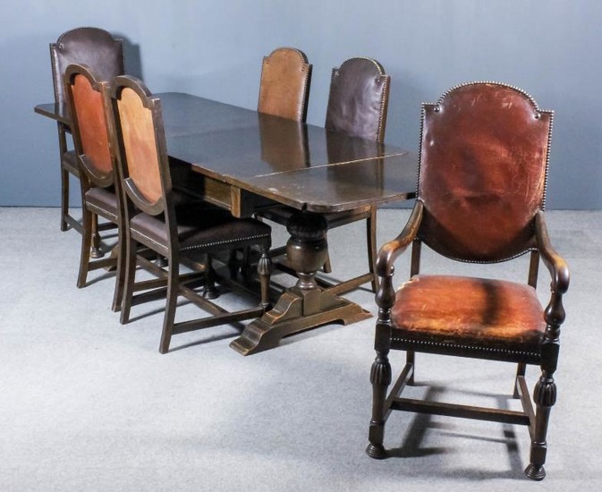 An Oak Draw Leaf Dining Table, 1920's/1930's, and a...