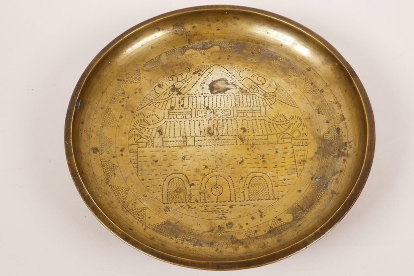 An antique Chinese bronze censer dish with engraved decorati...