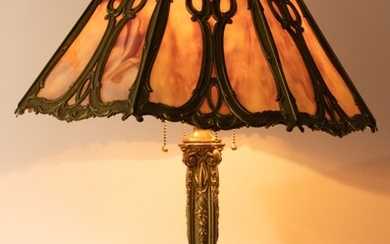 BRADLEY & HUBBARD SLAG GLASS TABLE LAMP, WITH GILT BRONZE PATINATED FRAME AND BASE C 1910, H 24" DIA 18.5"