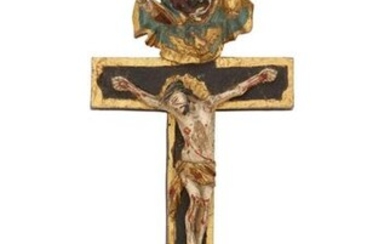 Baroque style reliquary cross in carved wood with polychrome and gold decoration. Christ on the cross is dominated by the dove of the Holy Spirit and the figure of God the Father holding the globe. At his feet is the Virgin of Sorrow. On the reverse...