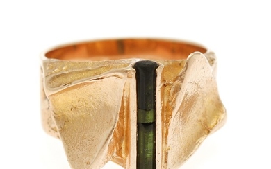Björn Weckström: A tourmaline “Illusion” ring set with a raw tourmaline crystal, mounted in 14k gold. Size 54. Finland 1969.
