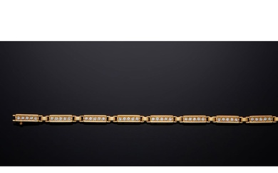 Bracelet ligne articulé en or jaune 18 carats (750/000) et diamants, composé de 9 maillons...