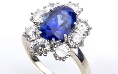 Burma sapphire and diamonds gold ring 18k white gold surrounded by brilliant cut diamonds ca....