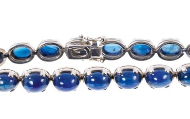 Cabochon blue sapphire and 18ct white gold bracelet with nineteen blue sapphire oval cabochons in 18ct white gold setting, 18cm