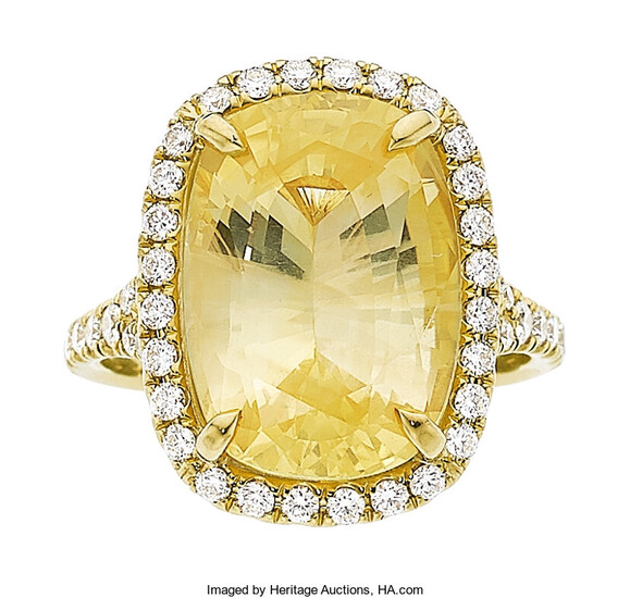 Ceylon Yellow Sapphire, Diamond, Gold Ring The ring centers...
