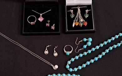 FOUR SUITES OF JEWELLERY comprising a turquoise bead necklac...