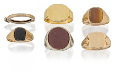 Five signet rings and a clip ring, including: a large cornelian set ring; two 9ct gold signet rings, total weight 13.9g; a 9ct gold and tiger's eye set ring; a 9ct gold black onyx ring; and a hinged clip ring (6)