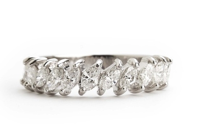 Georg Jensen & Wendel: A diamond eternity ring set with numerous marquise-cut diamonds weighing a total of app. 0.88 ct., mounted in 18k white gold. Size 51.