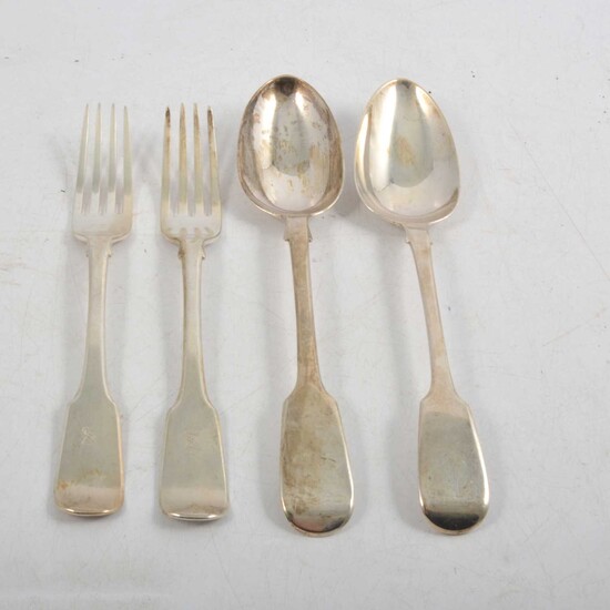 Georgian and Victorian silver table forks and tablespoons.