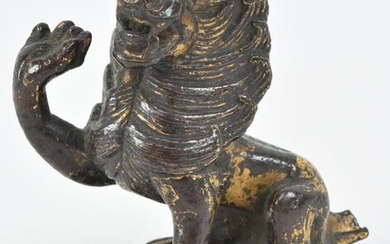 Gilt bronze rampant lion. China. Tang period (618-920).