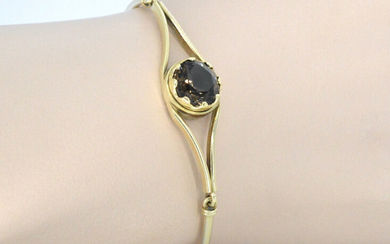 Gold bracelet with interchangeable gemstones