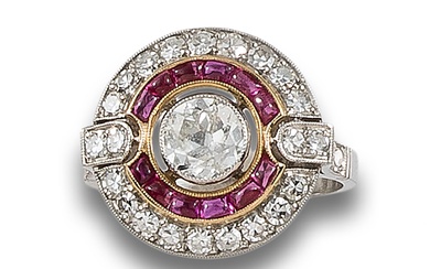 HALO RING WITH DIAMONDS AND RUBIES, IN YELLOW GOLD AND PLATINUM