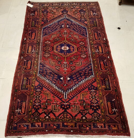 Hand-knotted oriental carpet with geometric decoration, dominantly red, Length 225...