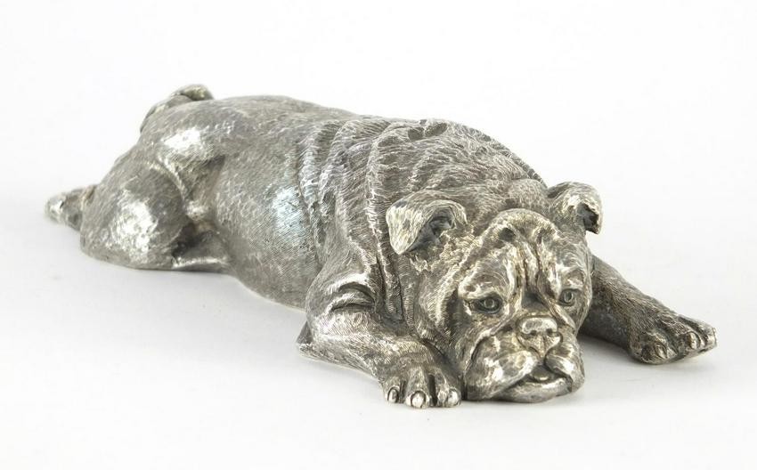 Heavy silver model of a recumbent pug dog, LM, London