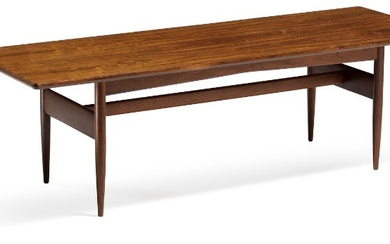 Ib Kofod-Larsen: Rectangular coffee table with tapering legs and stretchers of teak. Brazilian rosewood top with profiled rim.