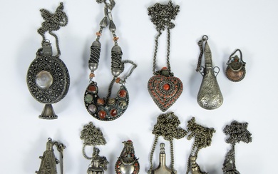 Large collection of silver and silver-plated Asian perfume bottles